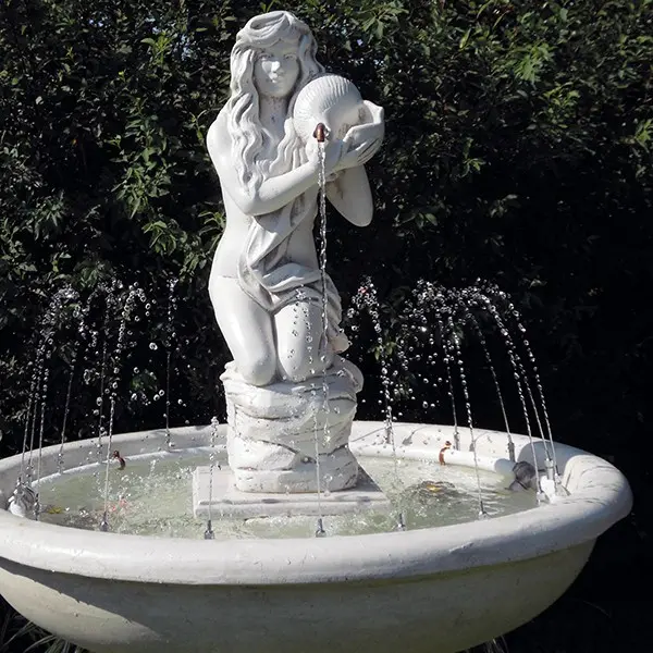 Wie man einen Brunnen an den Garten anpasst